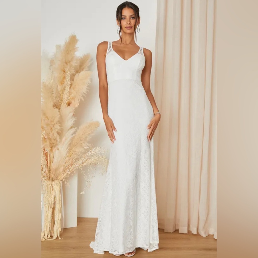 Brand new wedding dress size large (8-10)